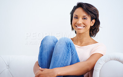 Buy stock photo Fashion, happy and portrait of woman on sofa with casual, trendy and stylish outfit in living room. Smile, positive and young female person from Mexico with cool style relaxing in the lounge at home.