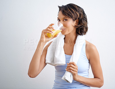 Buy stock photo Fitness, studio and portrait of woman with orange juice, smile and healthy diet for weight loss. Nutrition, detox and exercise, happy face of girl with vitamin c drink in glass on white background.