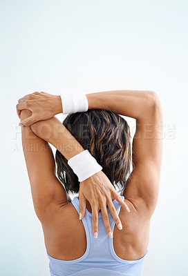 Buy stock photo Fitness, back and woman stretching arm to start exercise routine, pilates workout or cardio performance wellness. Studio back, training warm up and person ready for challenge on white background