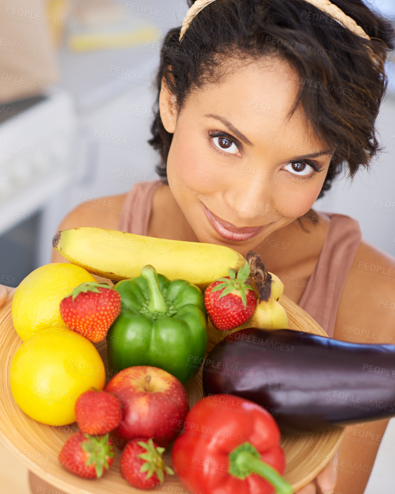 Buy stock photo Portrait, food and vegetables with a woman in the kitchen of her home for nutrition, diet or meal preparation. Face, health and recipe ingredients for cooking with a young person in her apartment