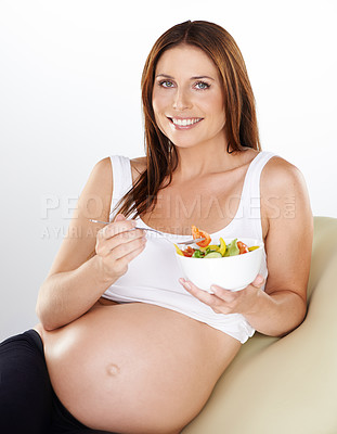 Buy stock photo Portrait, salad and pregnant with woman, vitamins and smile on a white studio background. Person, bowl and model with happiness, girl or pregnancy with vegetables, relax or maternal with healthy meal