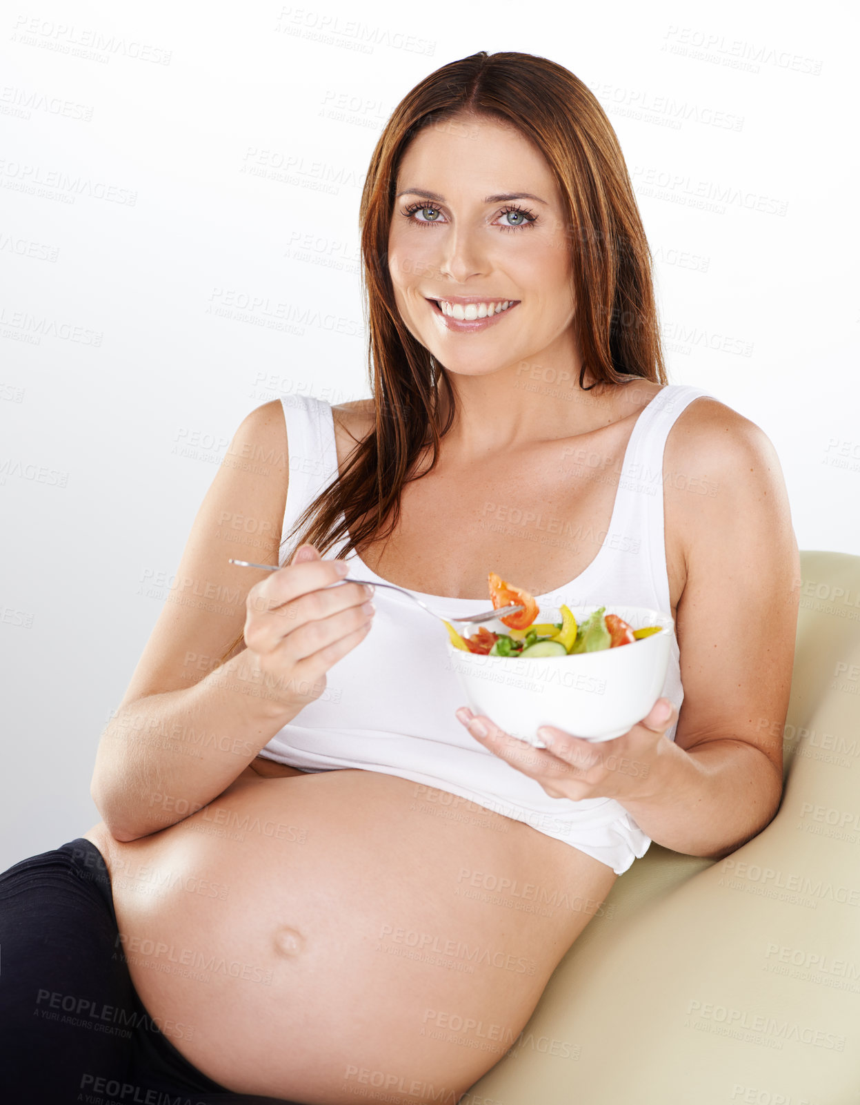 Buy stock photo Portrait, salad and pregnant with woman, vitamins and smile on a white studio background. Person, bowl and model with happiness, girl or pregnancy with vegetables, relax or maternal with healthy meal