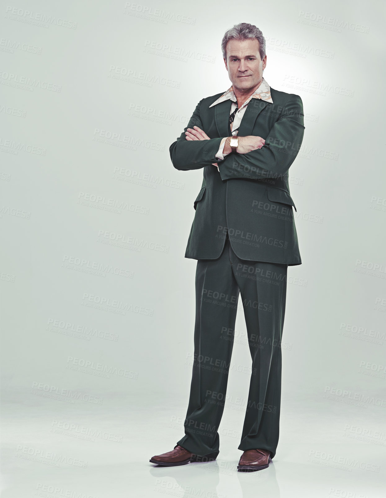 Buy stock photo Full length studio portrait of a mature man in a retro suit striking a confident pose