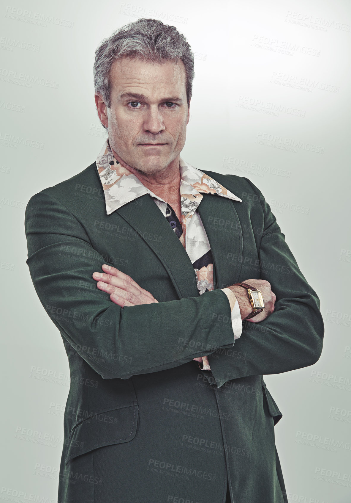 Buy stock photo Cropped studio portrait of a mature man in a retro suit striking a confident pose