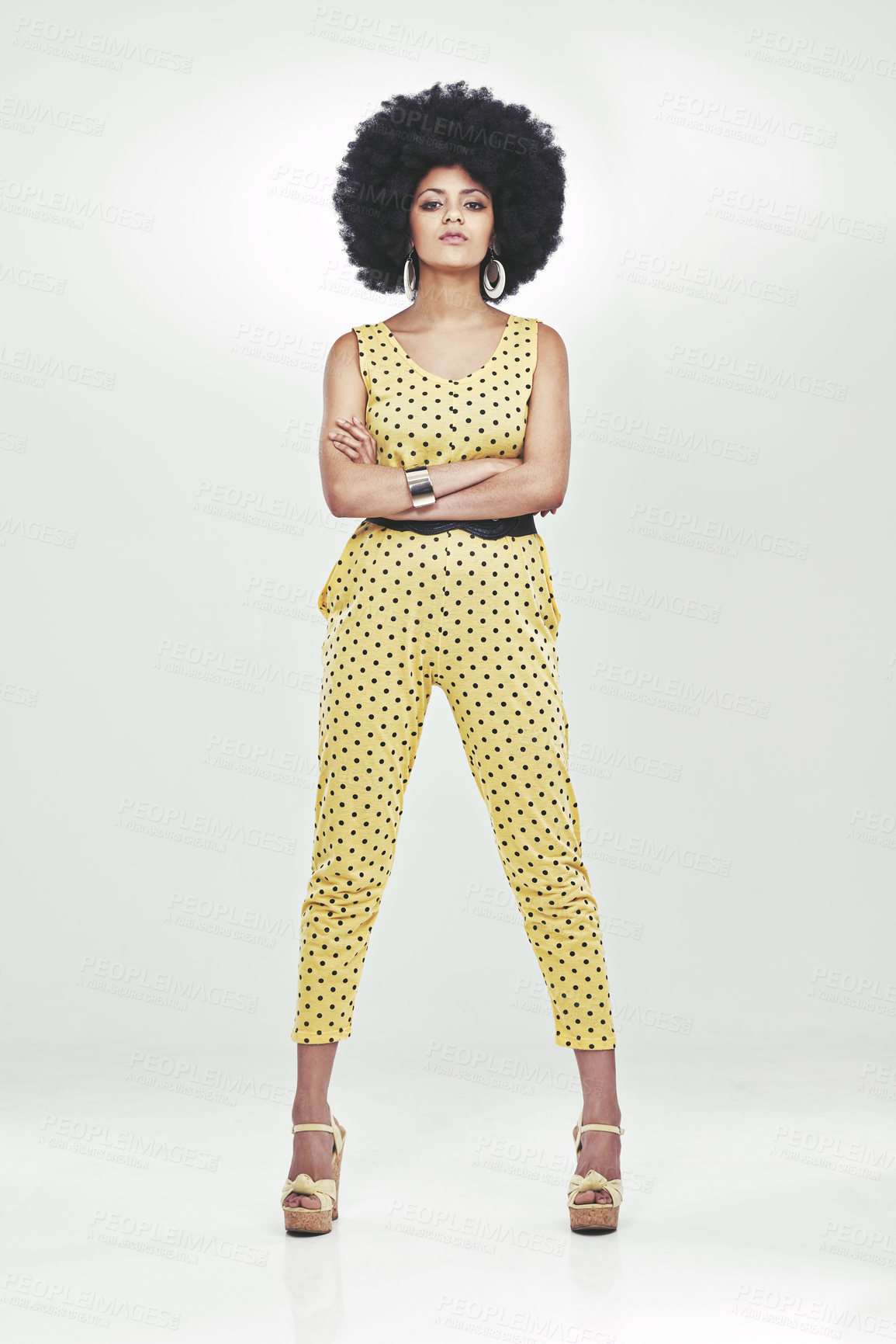 Buy stock photo Black woman, fashion and retro with portrait serious face in studio for vintage, unique look and proud with afro. African girl, stylish and confident with curly hair, and white background for mockup