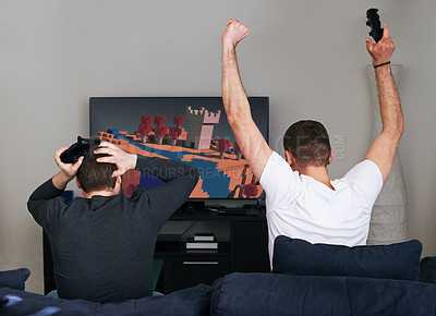 Buy stock photo Video game, men and celebration for online gaming, esports and sofa in home. Technology, win and victory or achievement in living room, back and digital for tv and success on metaverse streaming