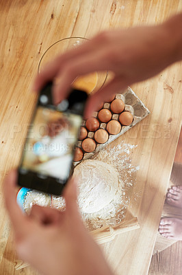 Buy stock photo Shot of a set of hands taking a picture of a group of ingredients