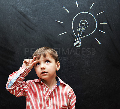 Buy stock photo Kid, thinking and lightbulb on chalkboard for solution, learning and creative mindset in school with inspiration. Child, student or boy with light bulb on a blackboard for knowledge, vision or ideas