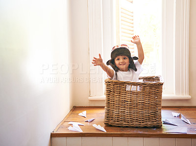 Buy stock photo Flying, paper plane and child playing with adventure, imagination and fun in basket at home. Fantasy, little pilot and playful boy in box with future dream, growth and development with airplane