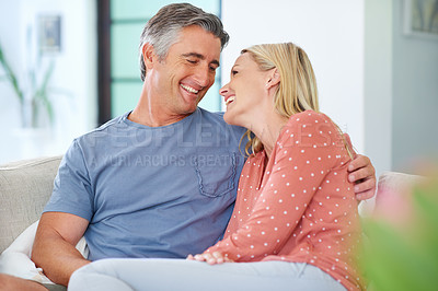 Buy stock photo Shot of a mature couple being affectionate at home