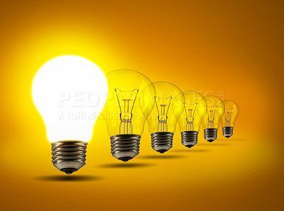 Buy stock photo Studio shot of a row of lightbulbs against an orange background