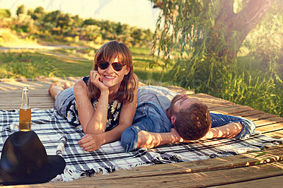 Buy stock photo Couple, happy and relax in nature for picnic, summer date and chill for anniversary. Woman portrait, man and outdoor with sunglasses with love, healthy relationship and commitment with trust or care