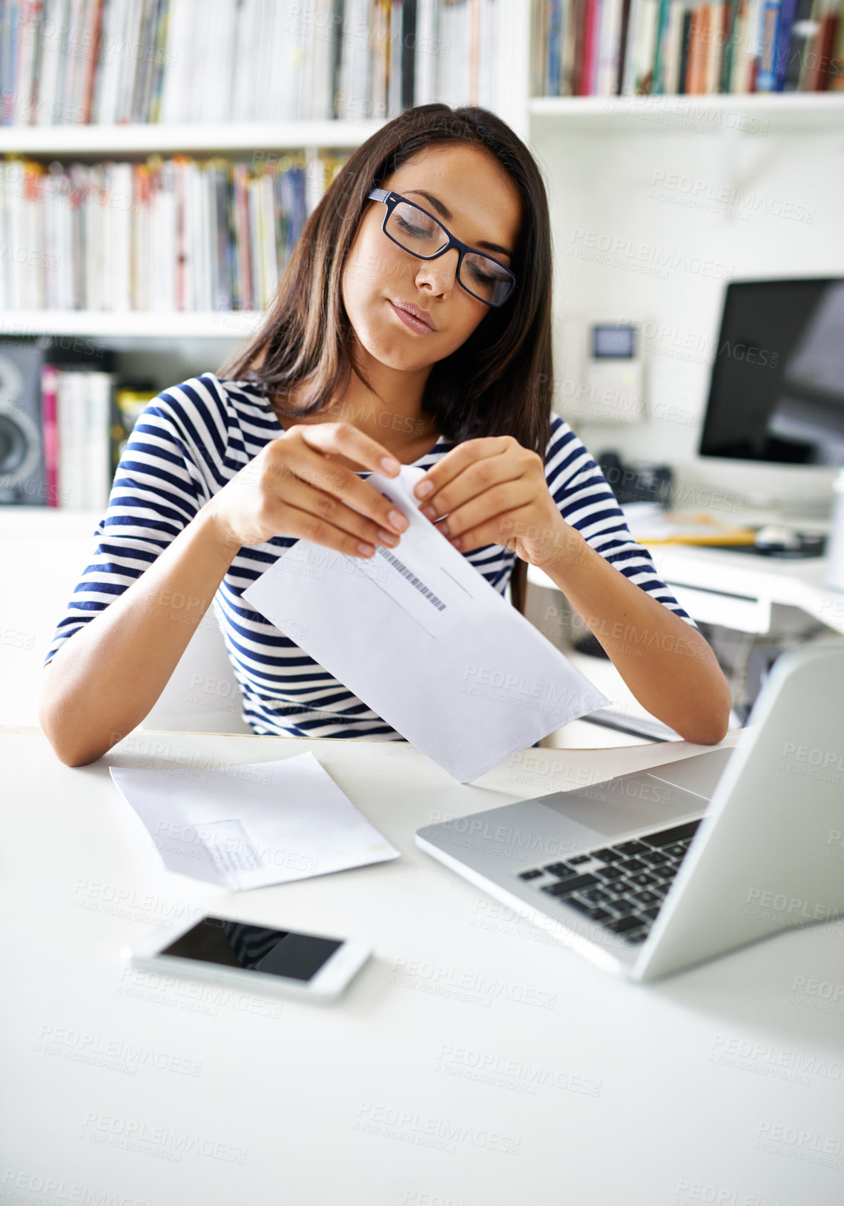 Buy stock photo Woman, laptop and open envelope for letter, reading or thinking for news on scholarship, application or results. Student, girl or person for documents for finance, loan or debt by computer at college