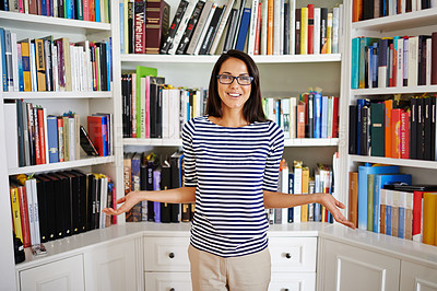 Buy stock photo Woman, portrait and confidence by bookshelf in home with books for reading, learning or knowledge in living room. Person, face and happy by library in house with magazine, journal or study collection
