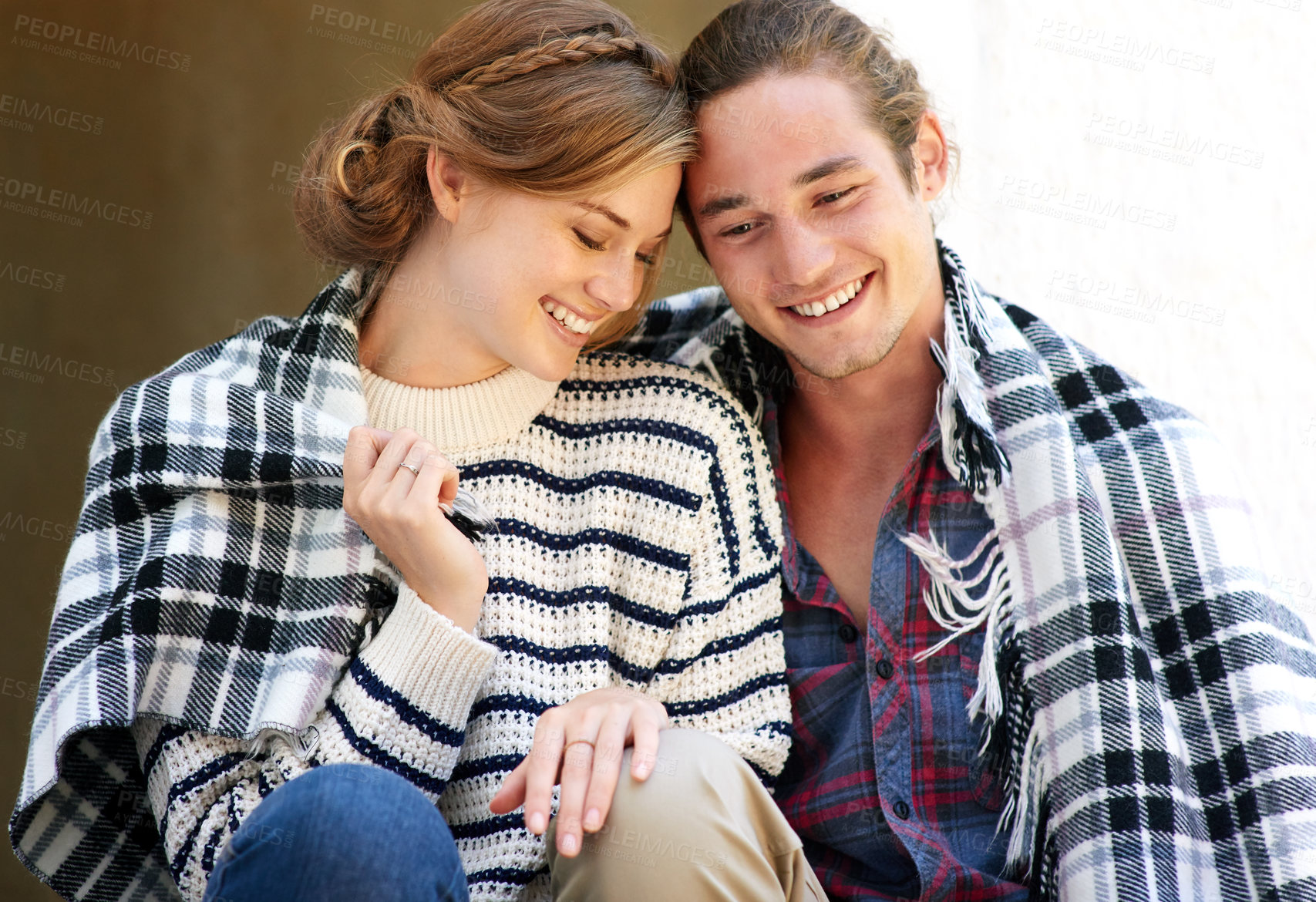 Buy stock photo Home, couple and smile with blanket for winter, connection and bonding in marriage with romance. Happy people, woman and man with love embrace for admiration, affection and commitment in relationship