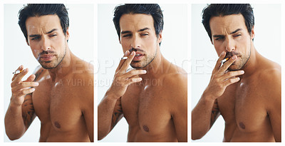 Buy stock photo Man cigarette and smoking in studio for confident, grunge and cool aesthetic on white background. Shirtless, body and tobacco for addiction, Greek male person and tattoo isolated on collage.