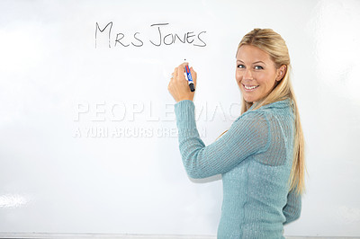Buy stock photo Happy woman, teacher portrait or writing on whiteboard for education, learning or teaching. Smile of a young professor, lecturer or class educator with name in classroom for middle school knowledge 