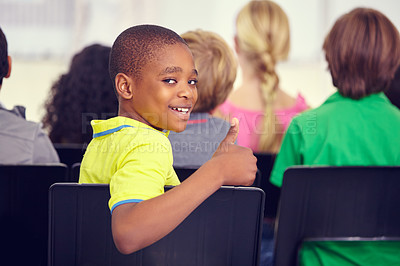 Buy stock photo Portrait, black kid and thumbs up of student in classroom, elementary school or class. Smile, education and child with hand gesture for like emoji, agreement and learning, success and approval sign.