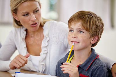 Buy stock photo School, woman helping student with homework or question and in classroom. Education or learning, female teacher assisting male child and boy with pencil at mouth for thinking or find solution.