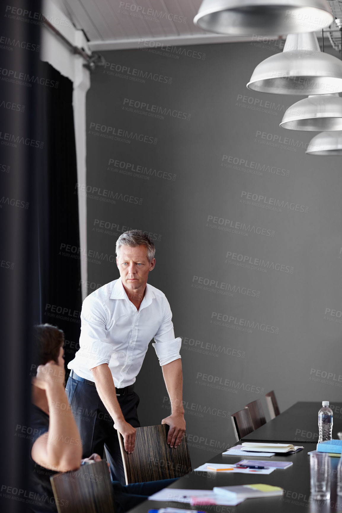Buy stock photo Documents, meeting and planning with designer men in boardroom for decision or problem solving. Collaboration, conversation and paperwork with business people in design workplace for feedback