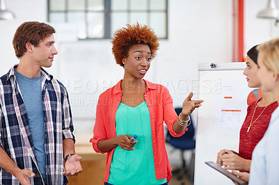 Buy stock photo Cropped shot of a group of coworkers in a meeting