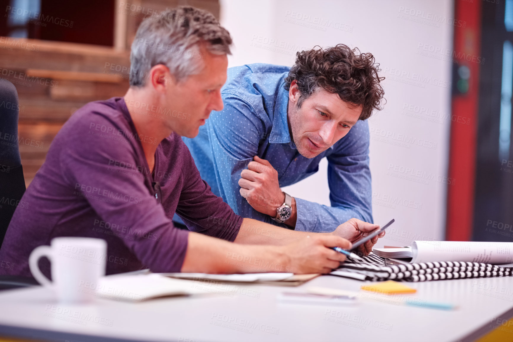 Buy stock photo Cropped shot of two male coworkers at work