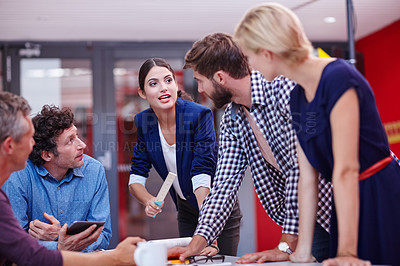 Buy stock photo Cropped shot of creative professionals brainstorming during a meeting