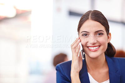 Buy stock photo Cropped portrait of an attractive young businesswoman talking on her cellphone