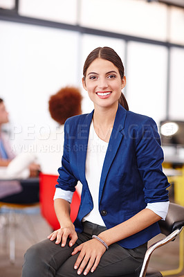 Buy stock photo Cropped portrait of an attractive young businesswoman sitting in her office