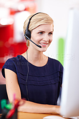 Buy stock photo Cropped shot an attractive young businesswoman working on her computer