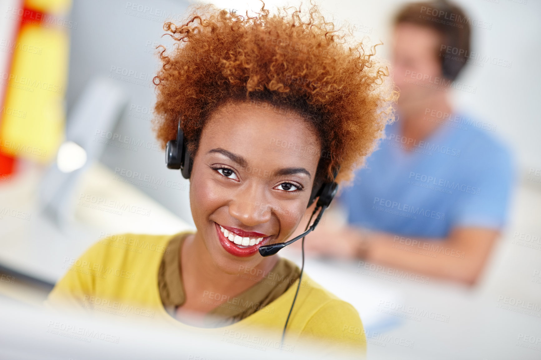 Buy stock photo Cropped portrait of an attractive young call center operator at work