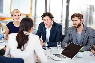 Buy stock photo Cropped shot of a group of designers having a meeting