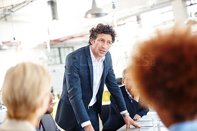 Buy stock photo Cropped shot of a group of designers in an office meeting