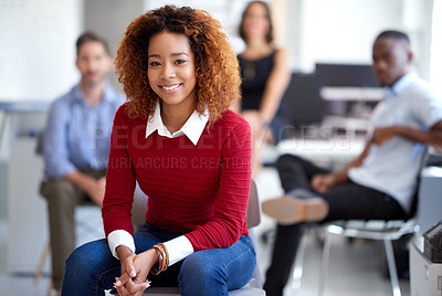 Buy stock photo Portrait of an attractive businesswoman with coworkers in the background
