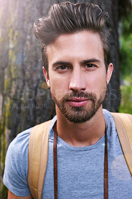 Buy stock photo Portrait of a handsome young man out in the forest