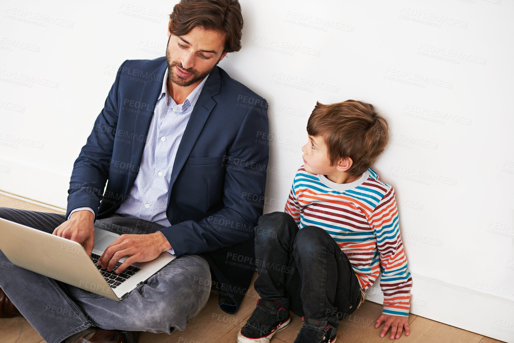 Buy stock photo Father, son and relax on floor with laptop for remote work with video streaming, online games and movies in home. Family, parent and child with technology on ground for bonding, communication and fun
