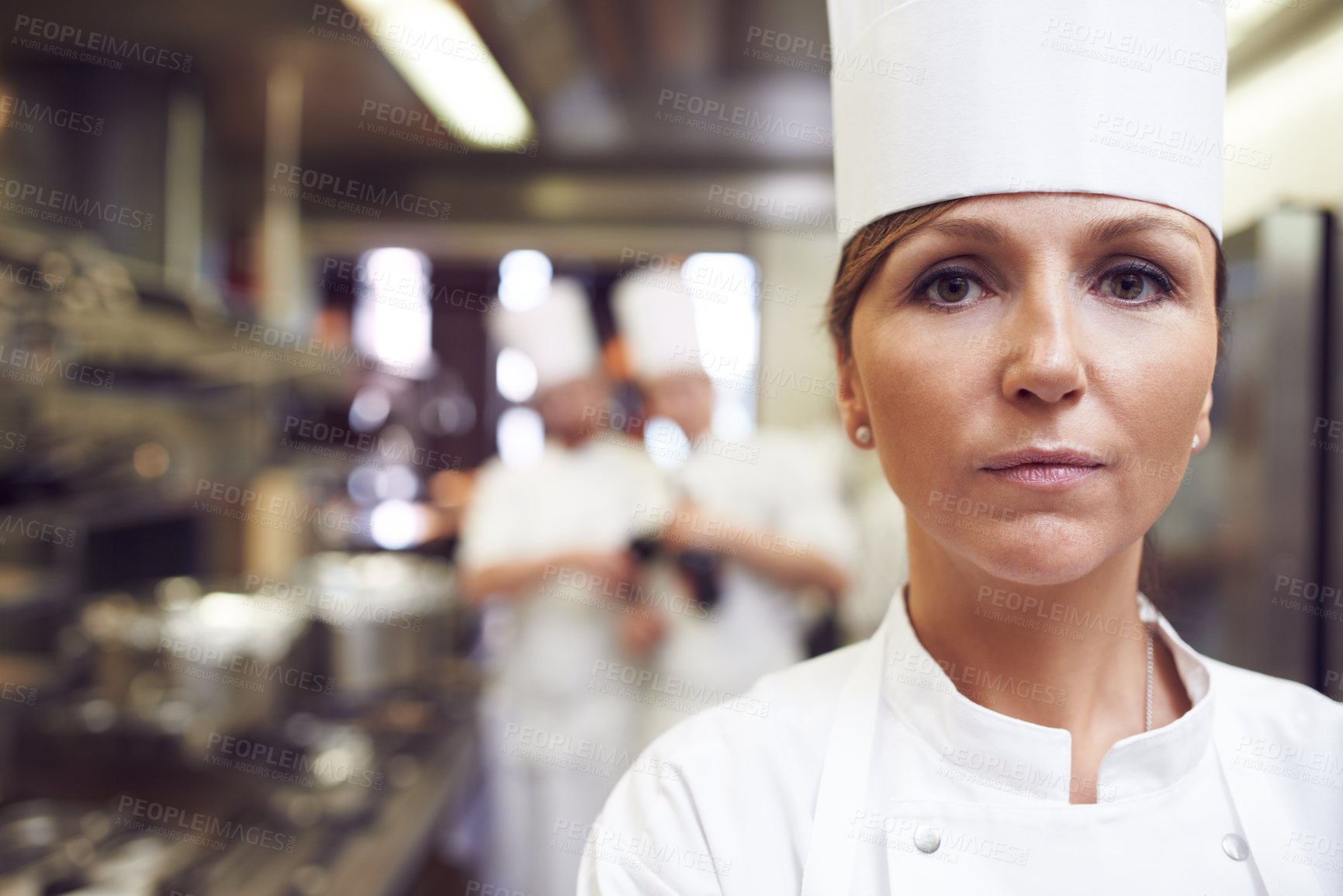 Buy stock photo Portrait of a chef in a professional kitchen