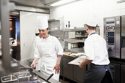 Buy stock photo Shot of the inner working of a professional kitchen