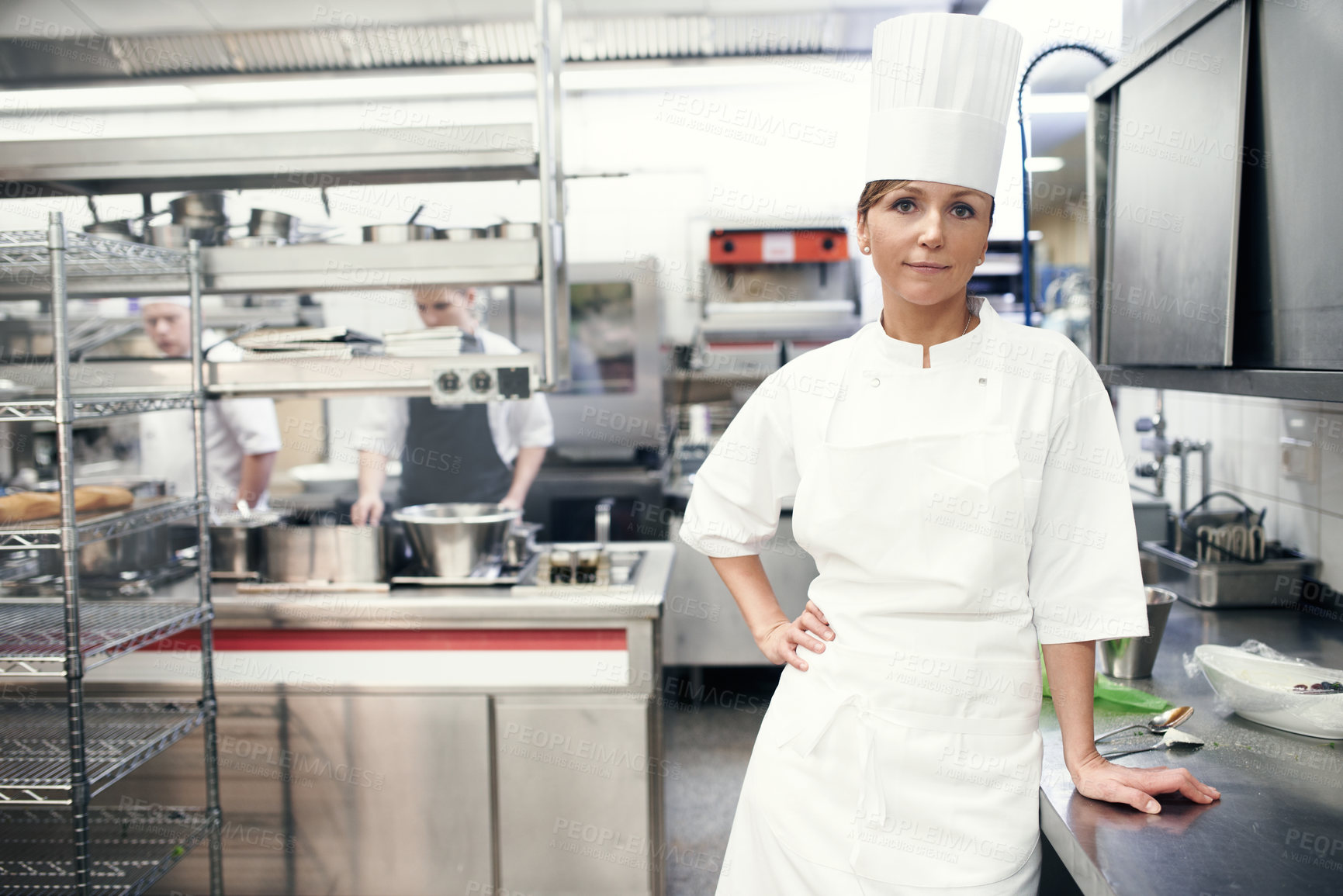 Buy stock photo Woman, portrait and chef in professional kitchen for cooking fine dining in hat or uniform, hospitality or service. Female person, face and restaurant employee or menu preparation, nutrition or food