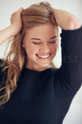 Buy stock photo Portrait of a beautiful young woman with her hands on her head
