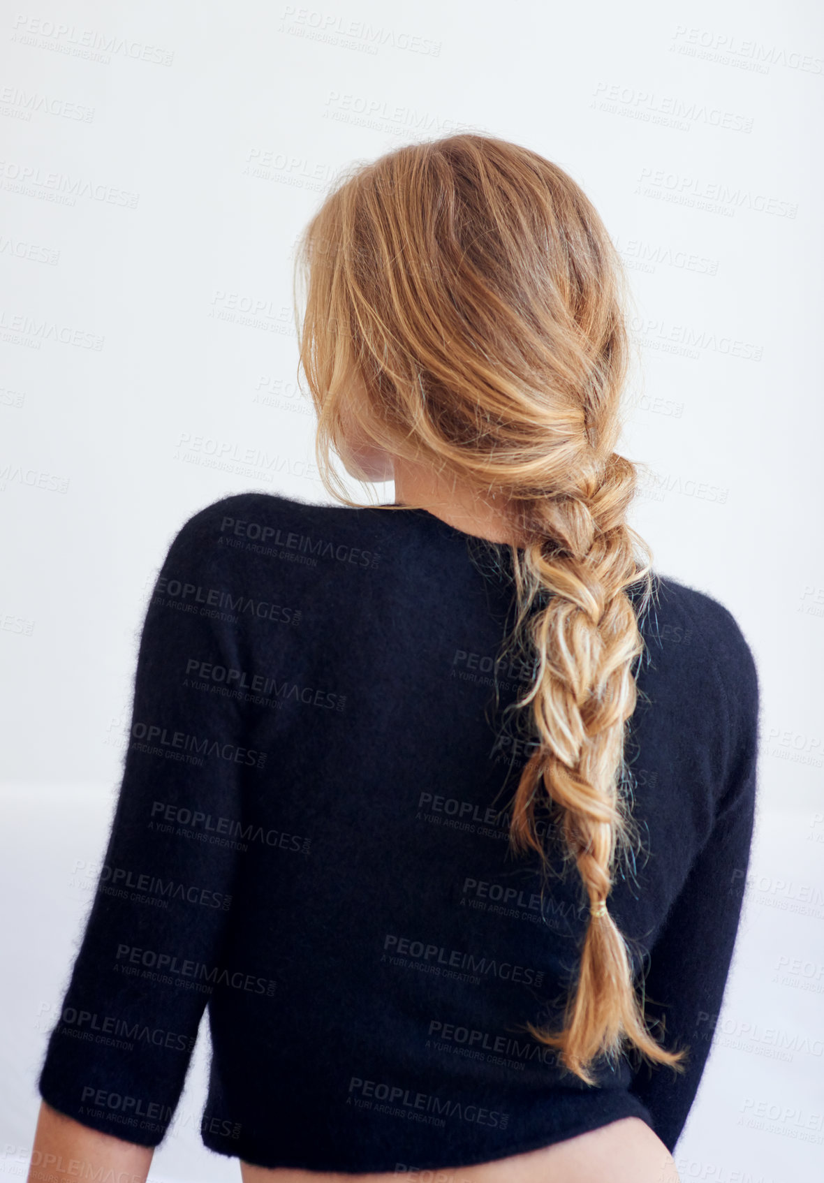 Buy stock photo Rearview shot of woman with a plaited hairstyle