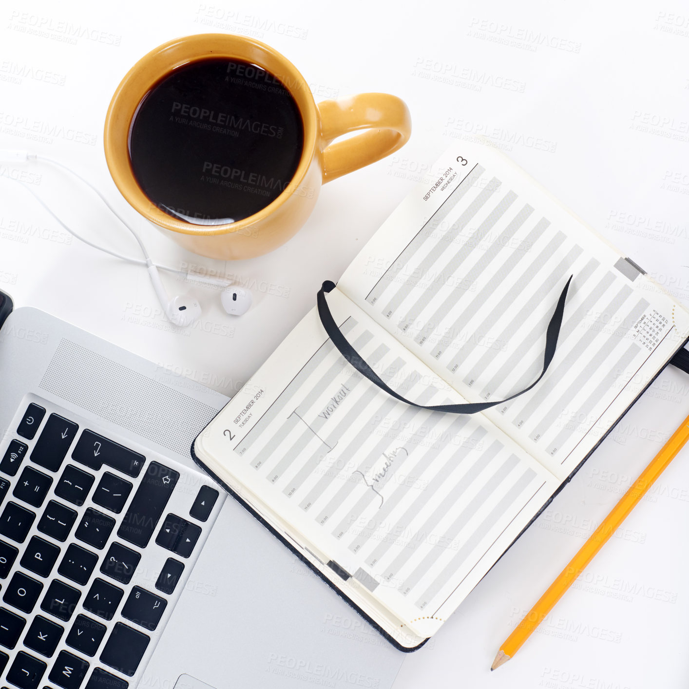 Buy stock photo Shot of a laptop and coffee mug on a table