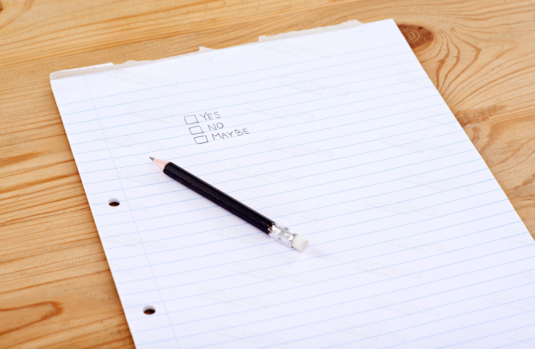 Buy stock photo A writing pad with the words yes, no and maybe in check boxes