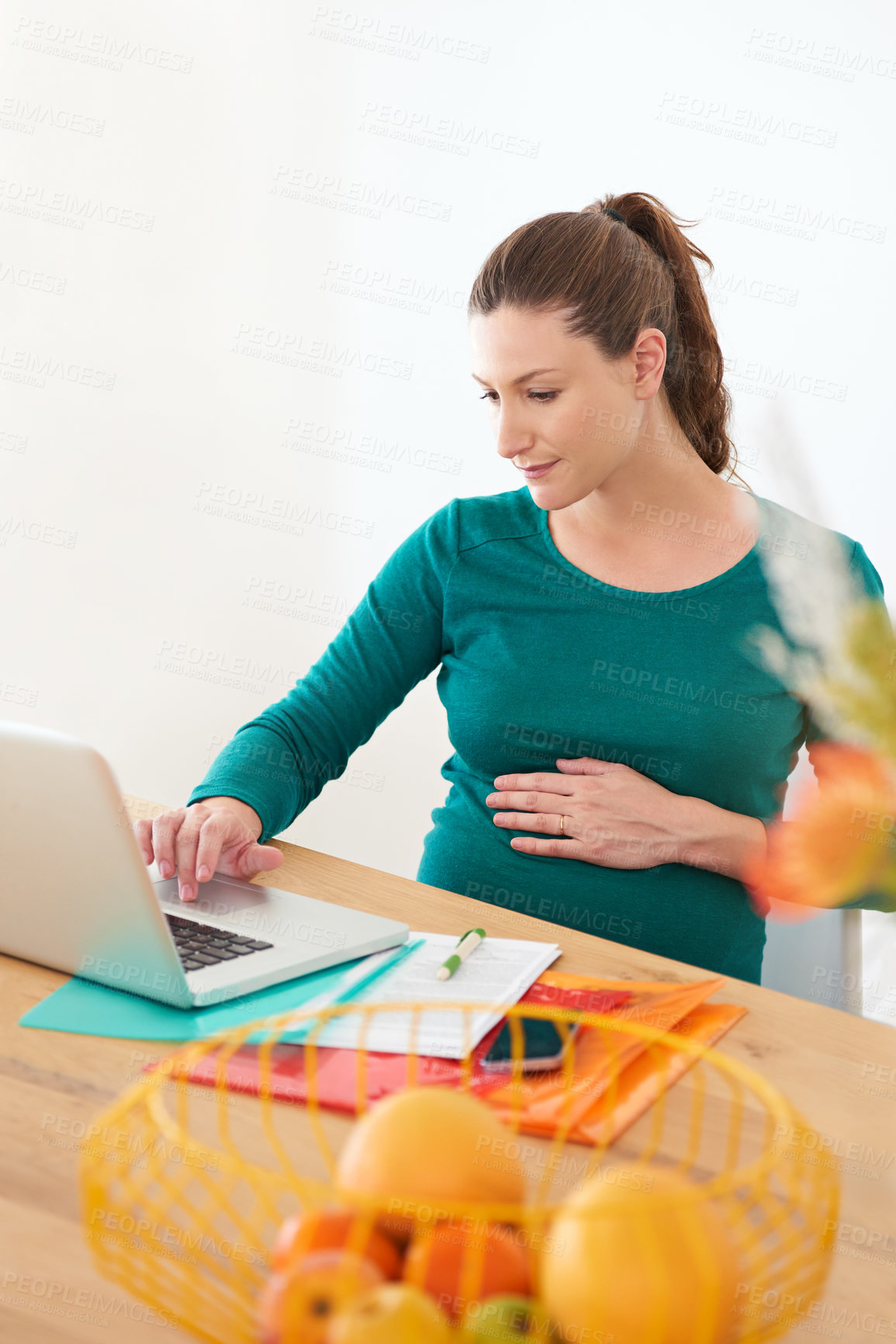 Buy stock photo Pregnant woman, laptop and browsing with research for telehealth, information or expecting at home. Female person, stomach and belly with computer for online search, maternity or pregnancy at house