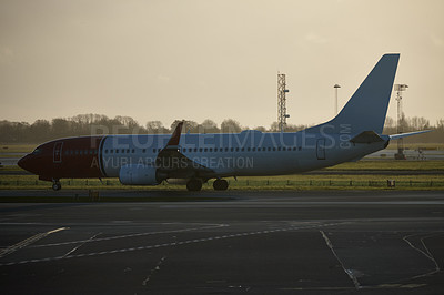 Buy stock photo Shot of an airplane at an airport