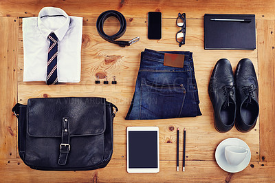 Buy stock photo High angle shot of a stylish business outfit laid out on a wooden table