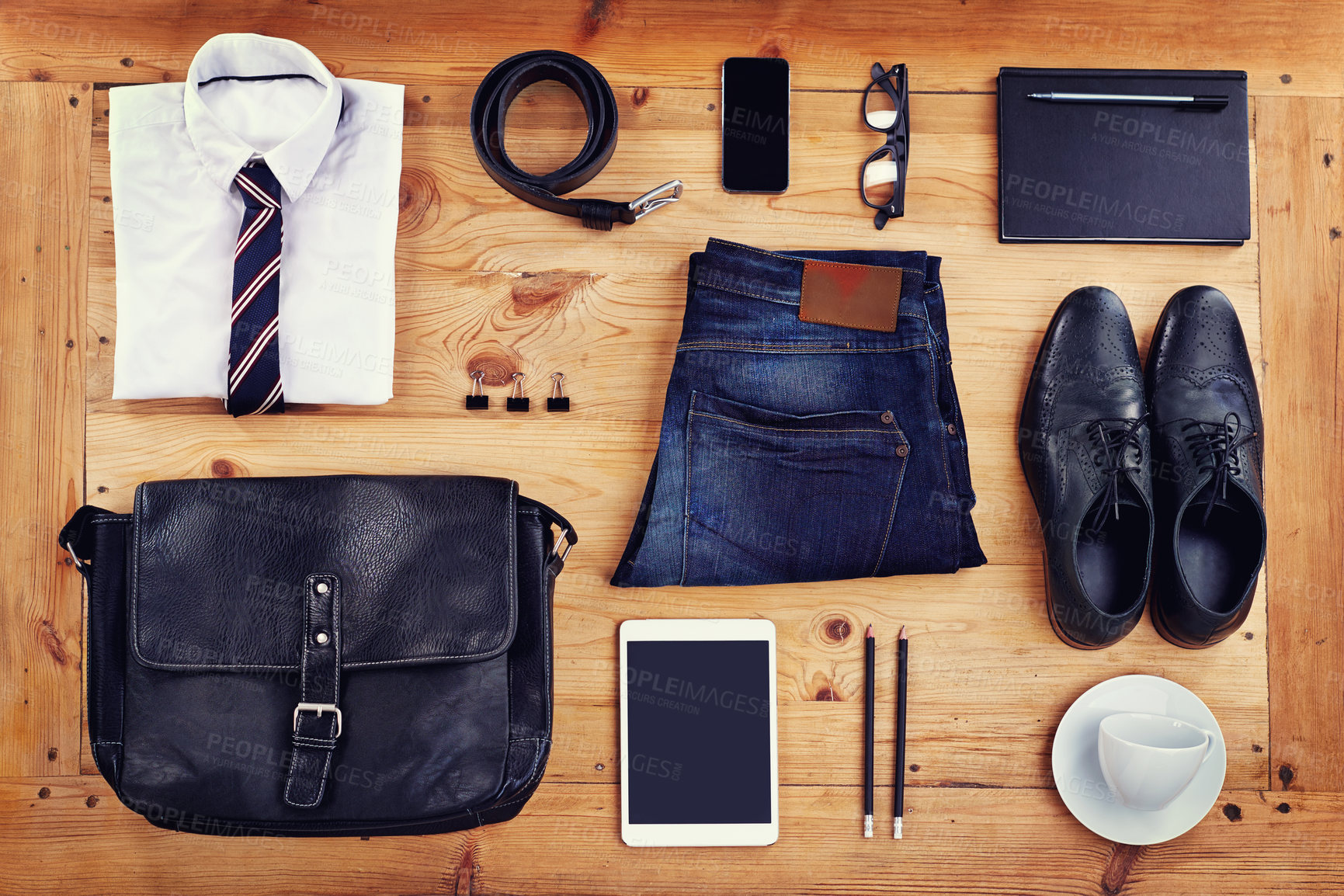 Buy stock photo High angle shot of a stylish business outfit laid out on a wooden table