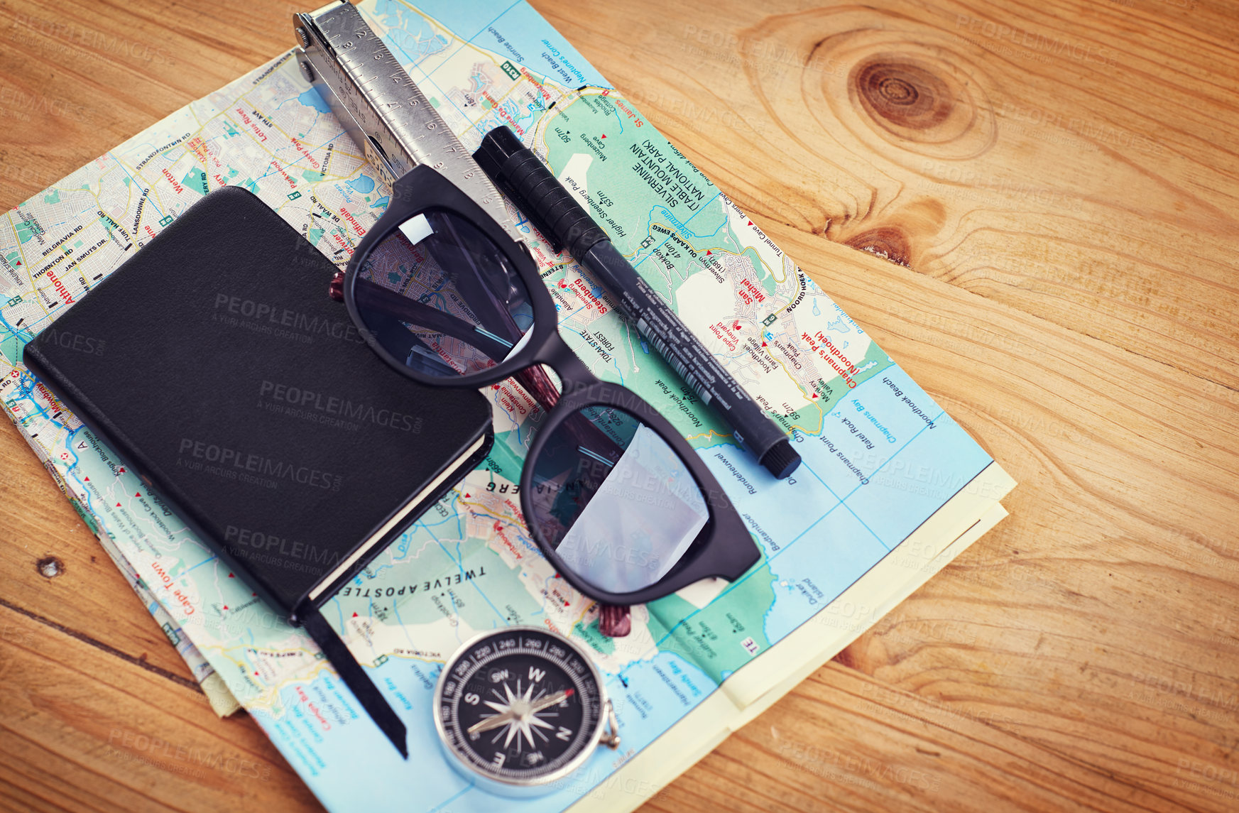 Buy stock photo Sunglasses, travel and notebook with compass on map for itinerary schedule, adventure guide and direction. Tools, vacation and location with holiday planning for tourism, navigation and explore