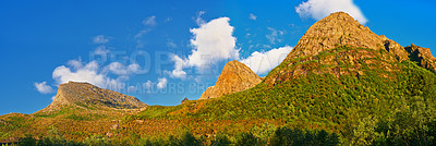 Buy stock photo Mountain, moss and clouds in sky in nature by journey for travel destination in Norway. Environment, landscape and peak outdoor for tourism vacation, holiday trip to landmark in countryside scenery.