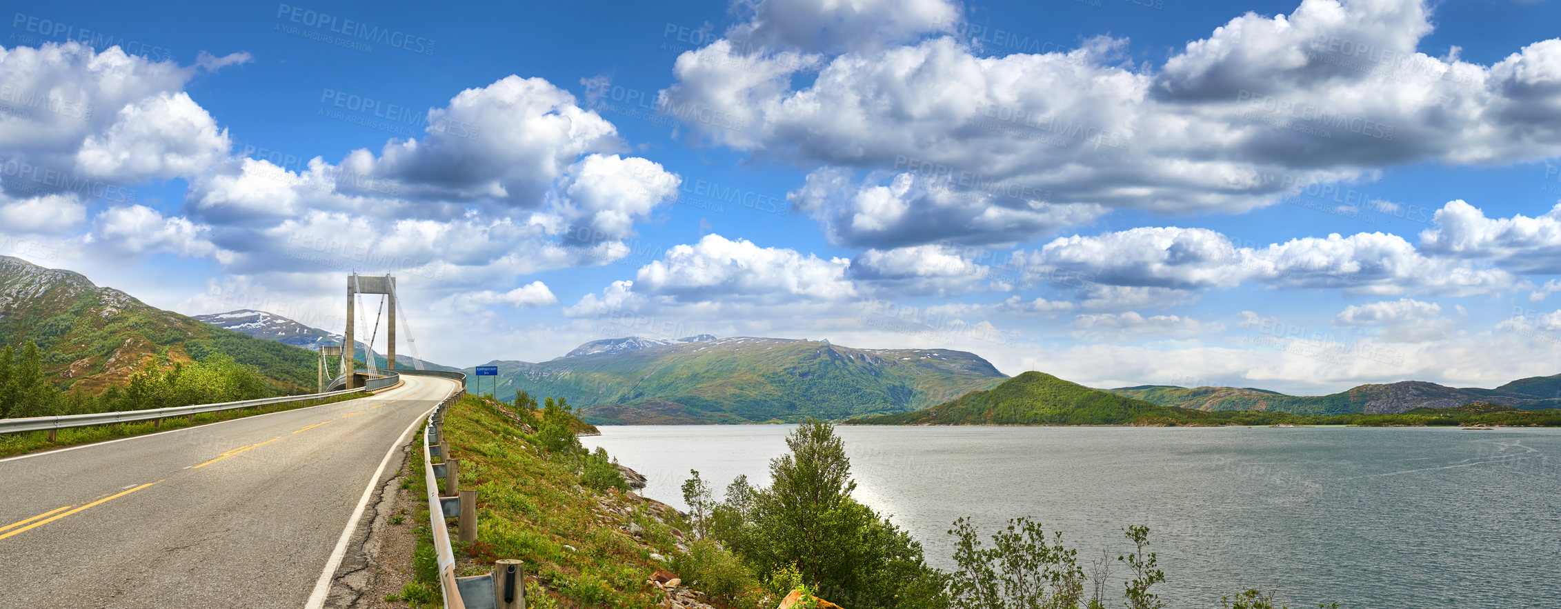 Buy stock photo Lake, road or landscape of mountains with bridge, natural environment or countryside in Norway. Zen nature, calm peace or scenic view of Europe or clouds for outdoor travel, holiday or vacation break